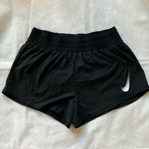 Nike Women's Black Athletic Shorts with White Swoosh Accent